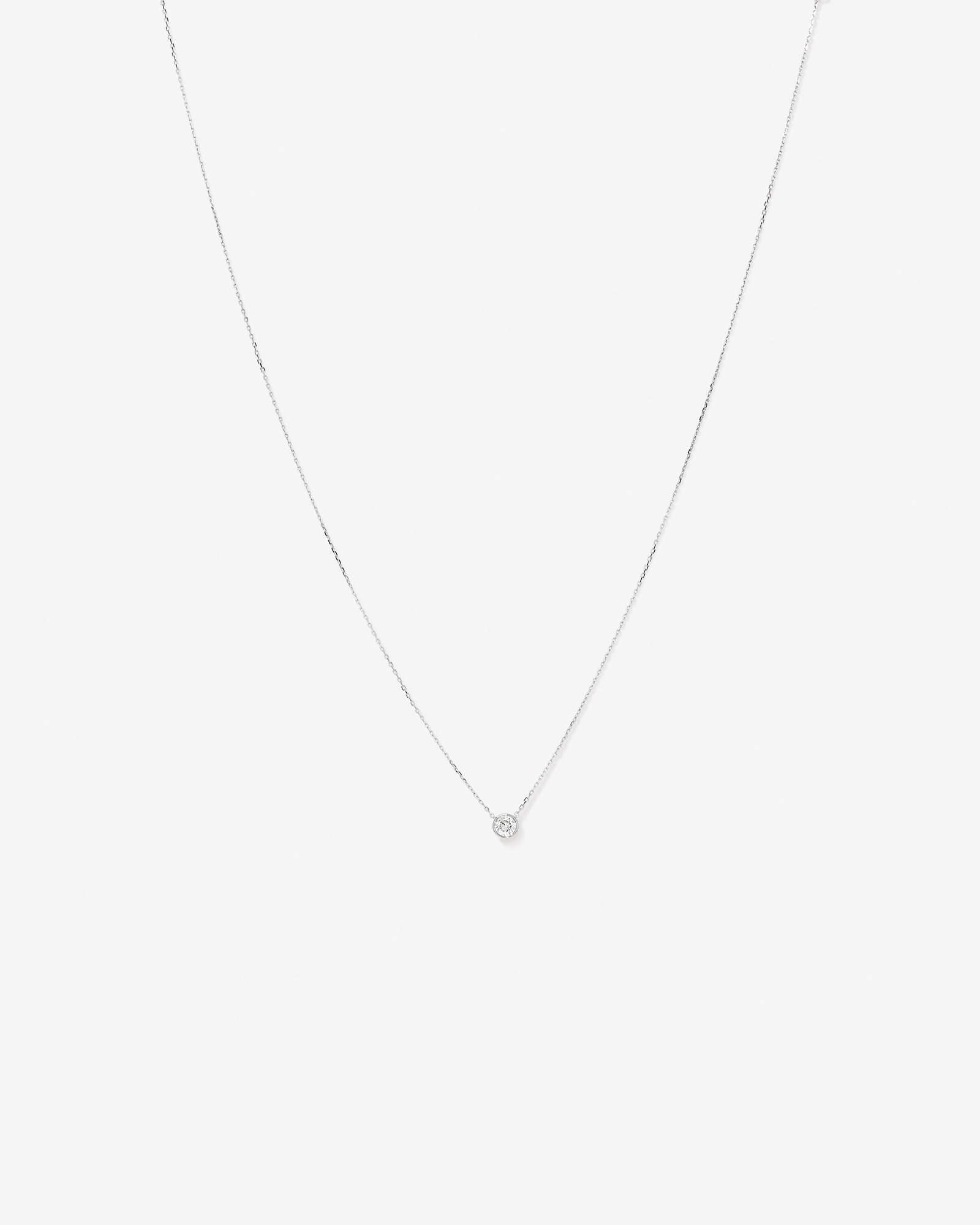 0.25 Carat TW Round Brilliant Diamond Bezel Set Pendant in 18kt White Gold