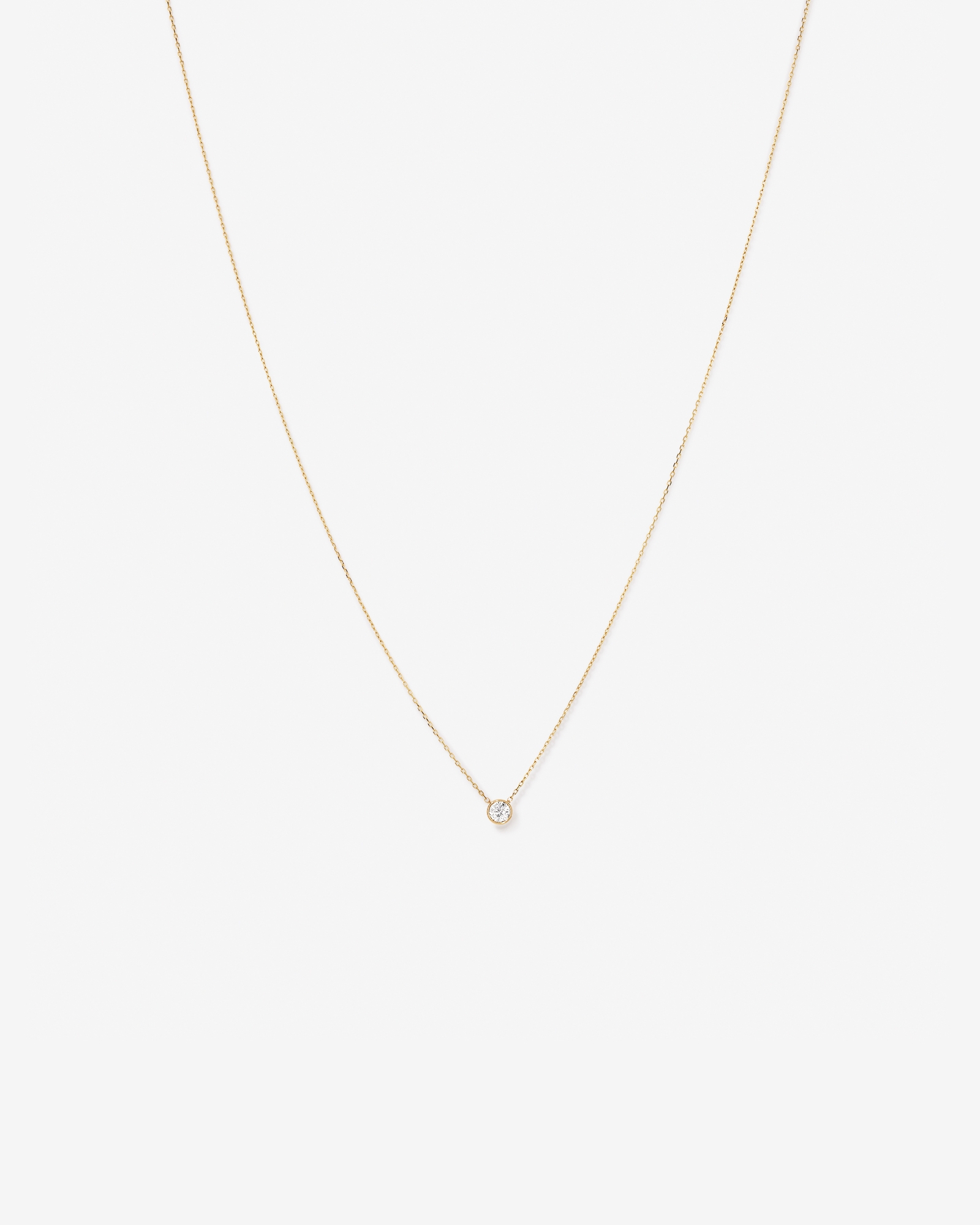 0.25 Carat TW Round Brilliant Diamond Bezel Set Pendant in 18kt Yellow Gold