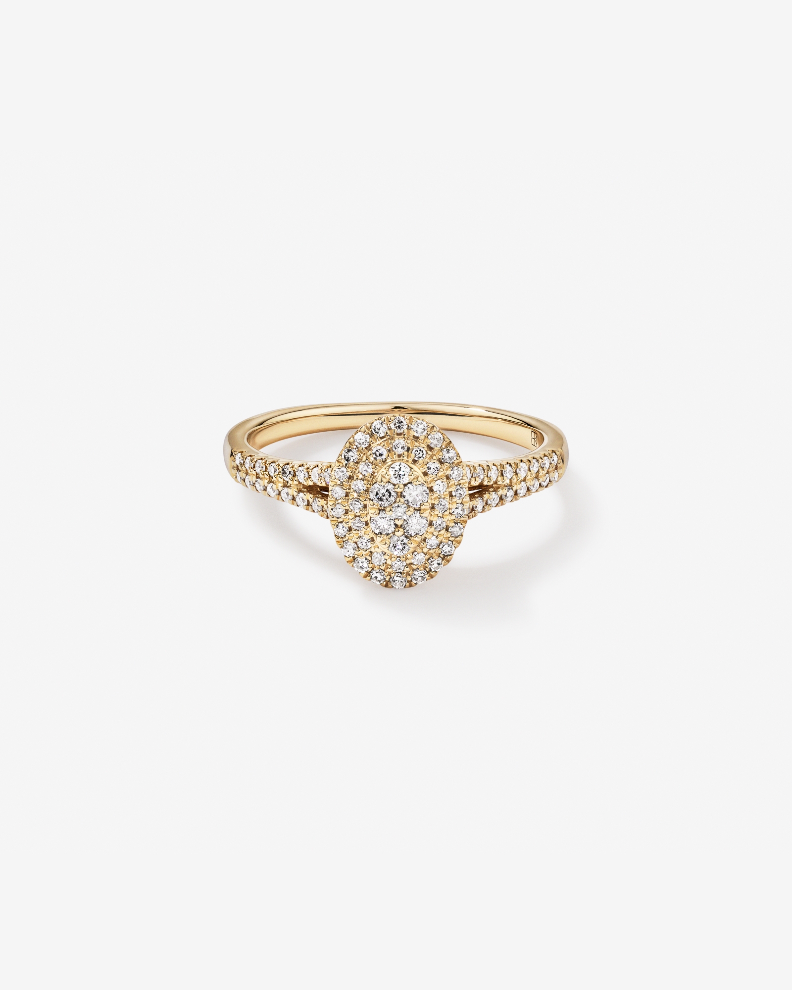 0.30 Carat TW Oval Shaped Cluster Diamond Halo Engagement Ring in 10kt Yellow Gold